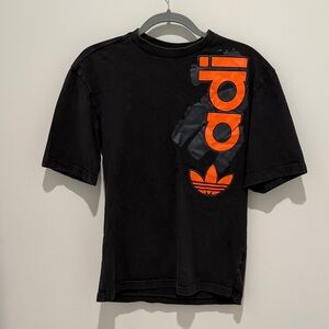 Adidas Men's Black Tee with Orange Logo